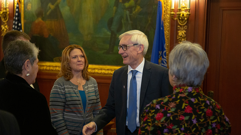 Jennifer Peterson with Gov. Evers