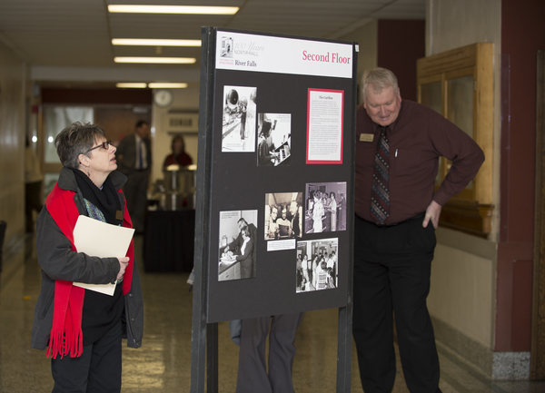 Carol Rogers and Dan McGinty looking at the North Hall history display boards at the SIE event, February 4, 2014