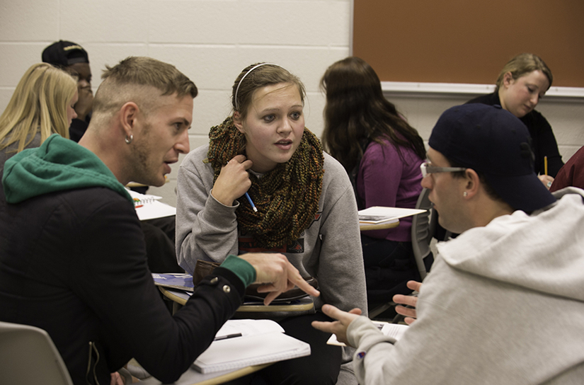 UWRF students engage in a classroom group discussion.