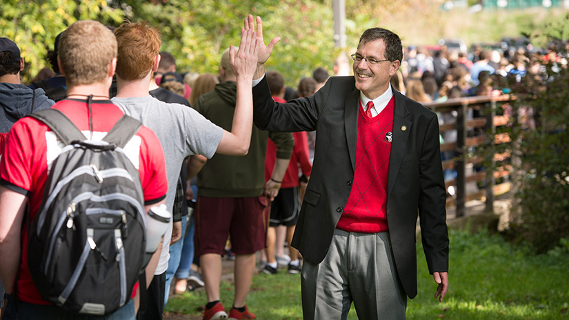 dean academic day high five