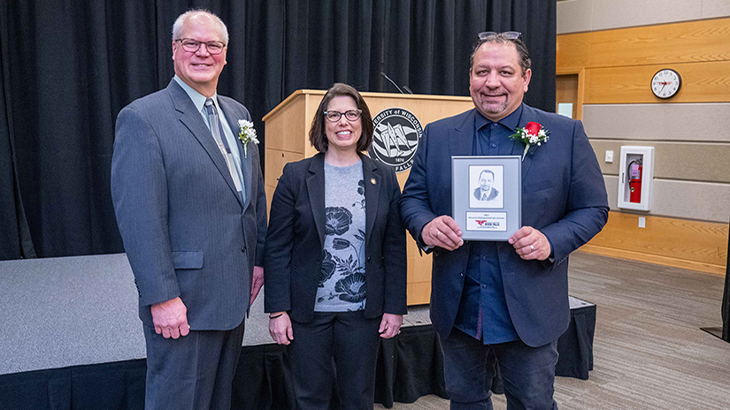 CAFES Interim Dean Olson, UWRF Chancellor Maria Gallo and David Lenzmeier, 2023 Distinguished Agriculturalist, pose for a photo