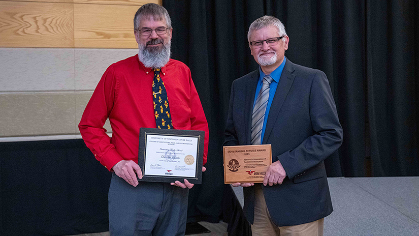 Tim Buttles, 2023 CAFES Outstanding Faculty Awardee, and Roger King representing WAAE for the Outstanding Service Award.