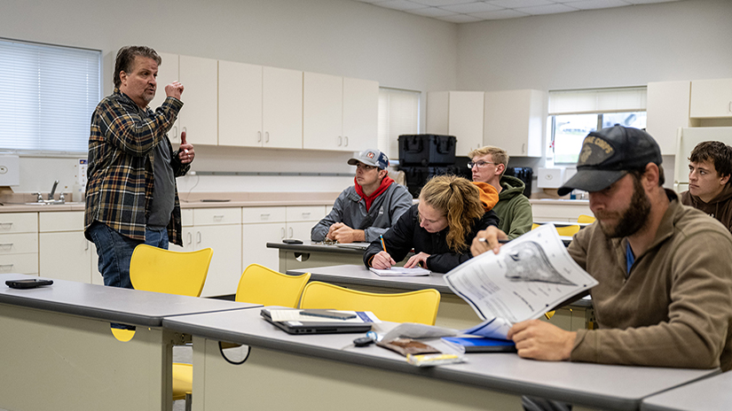 FISC students sit in a classroom on the first day of classes