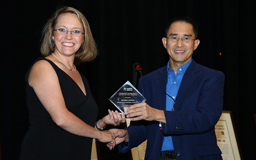 Sierra Howry, associate professor of agricultural economics at UWRF, accepts the 2018 Agricultural and Applied Economics Association Distinguished Teaching Award.