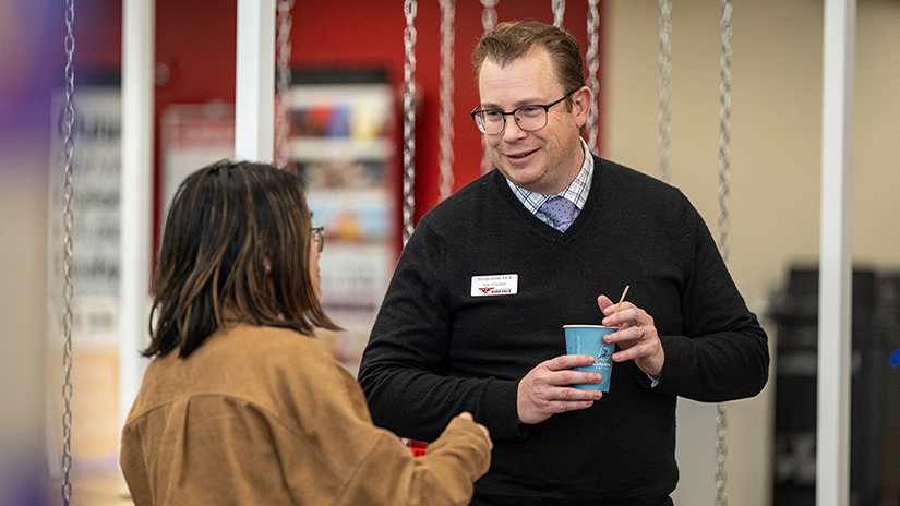 Michael Gilmer, dean of students, interacts with a student during a Mental Health Mondays event at the university. Gilmer has spent much of his time during his first semester at UWRF helping address programs regarding student mental health