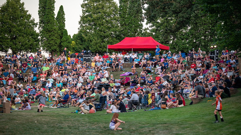 Crowd gathered to hear a Kids from Wisconsin performance at UWRF