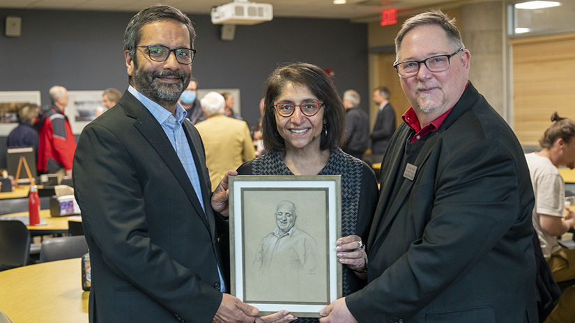 Imtiaz Moosa’s siblings Rahim Moosa, left, and Taslim Moosa, with Dean Yohnk, UWRF College of Arts and Sciences dean, with a drawing of Imtiaz presented to them at the inaugural Dr. Imtiaz Moosa Philosophy and Ethic Speaker Series event April 25.