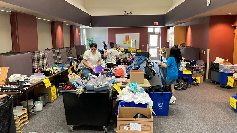 Students sort through donated items