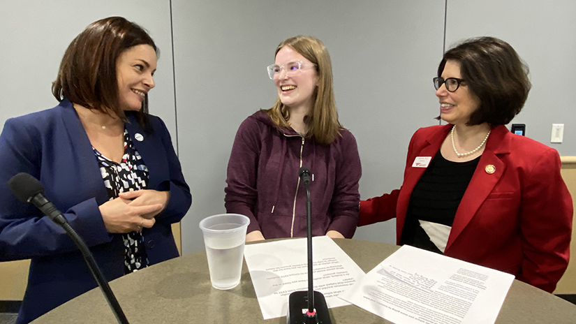 Administrators and a student discuss partnership.