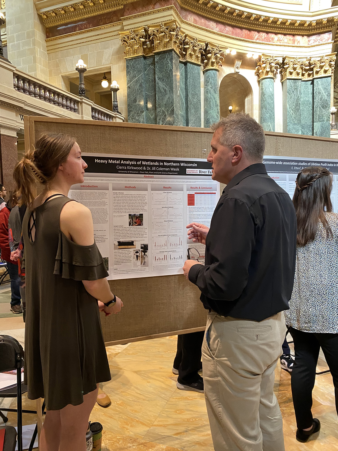 UW-River Falls student Cierra Kirkwood discusses her research about heavy metals in northern Wisconsin waterways with Rep. Shannon Zimmerman, R-River Falls, during the March 8 Research in the Rotunda event at the state Capitol in Madison.