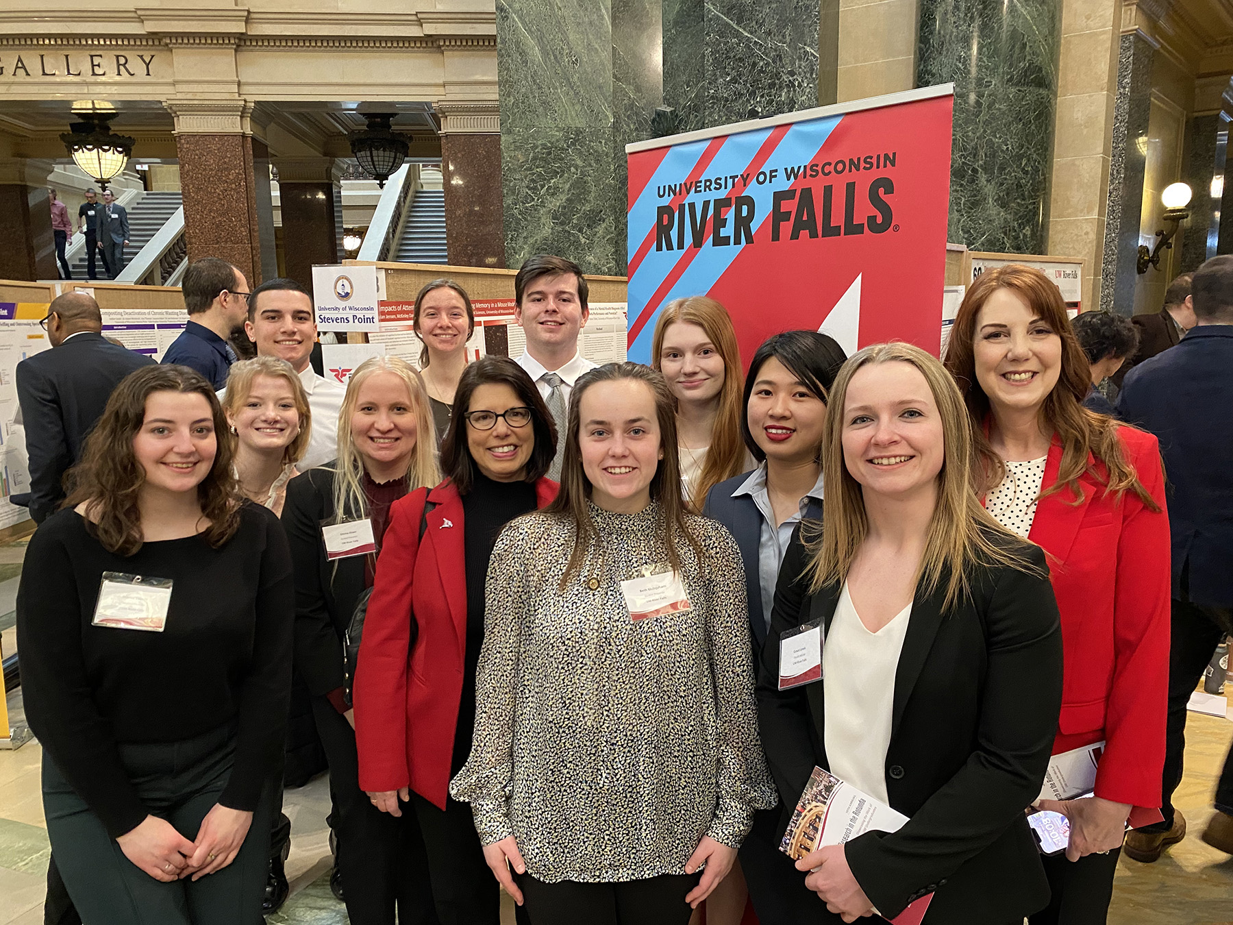 Students pose at the recent Research in the Rotunda event at the Wisconsin State Capitol Building