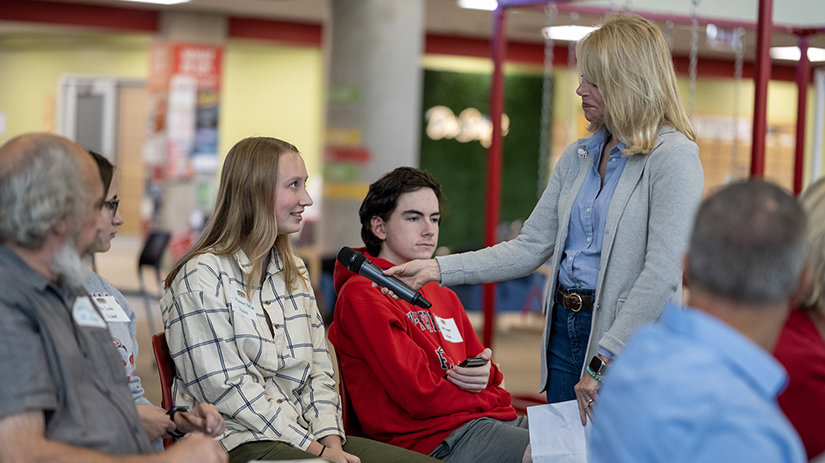 UW-River Falls student Madeline Nelson, center, shares her thoughts with Minnesota Public Radio host Kerri Miller during an event at the university Tuesday titled “What it Takes to Educate a Nimble & Knowledgeable Rural Workforce: Stories & Solutions,” pa