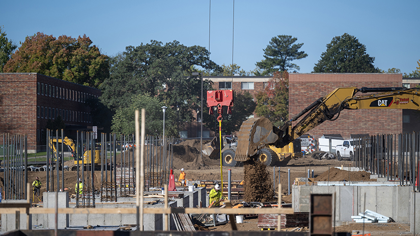 Photo shows the SciTech construction site with heavy equipment and construction materials 