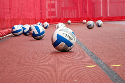 Volleyballs in Gym