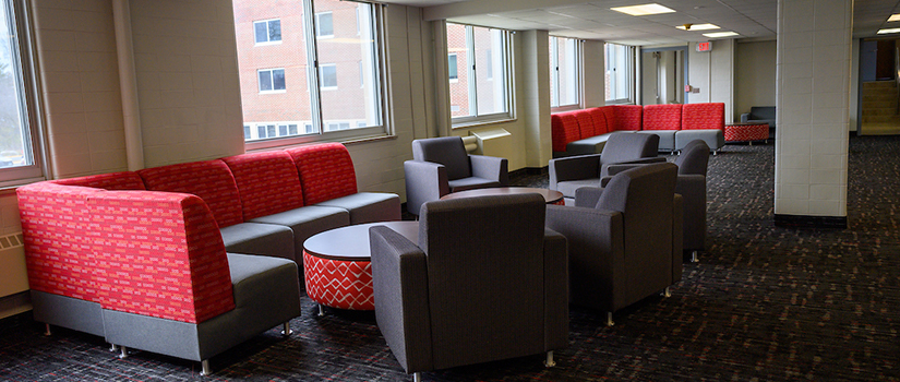 Hathorn basement lounge area with seating and windows