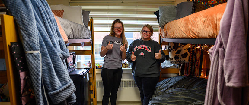 Hathorn room with roommates smiling