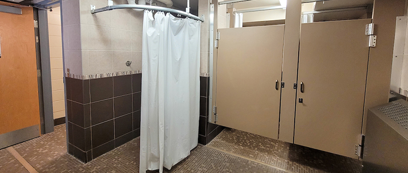 Johnson Hall bathroom includes private toilet and shower stalls