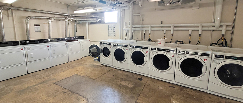 Johnson Hall laundry room includes multiple washers and dryers