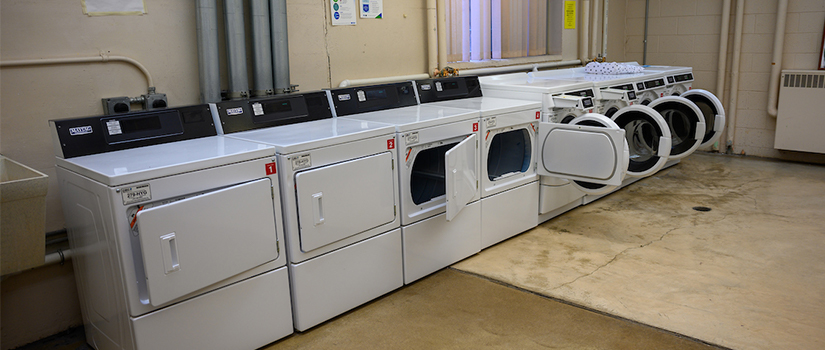 Stratton Hall laundry room includes multiple washers and dryers