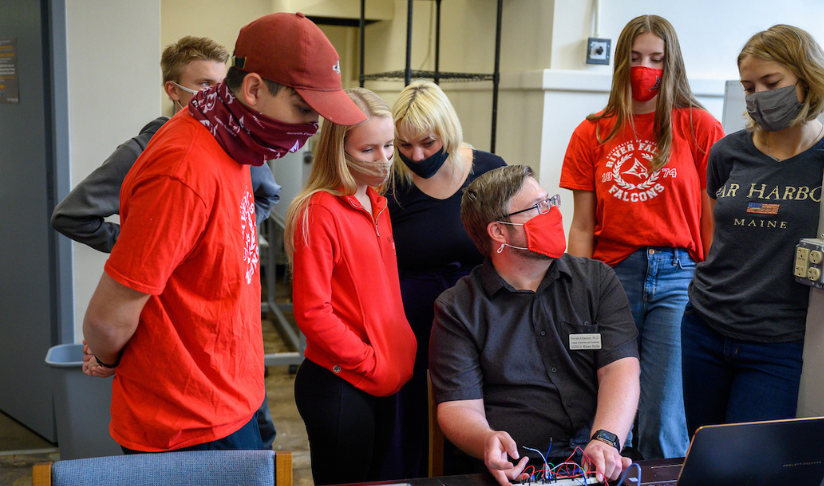 College of Business and Economics MakerSpace students listening to professor  