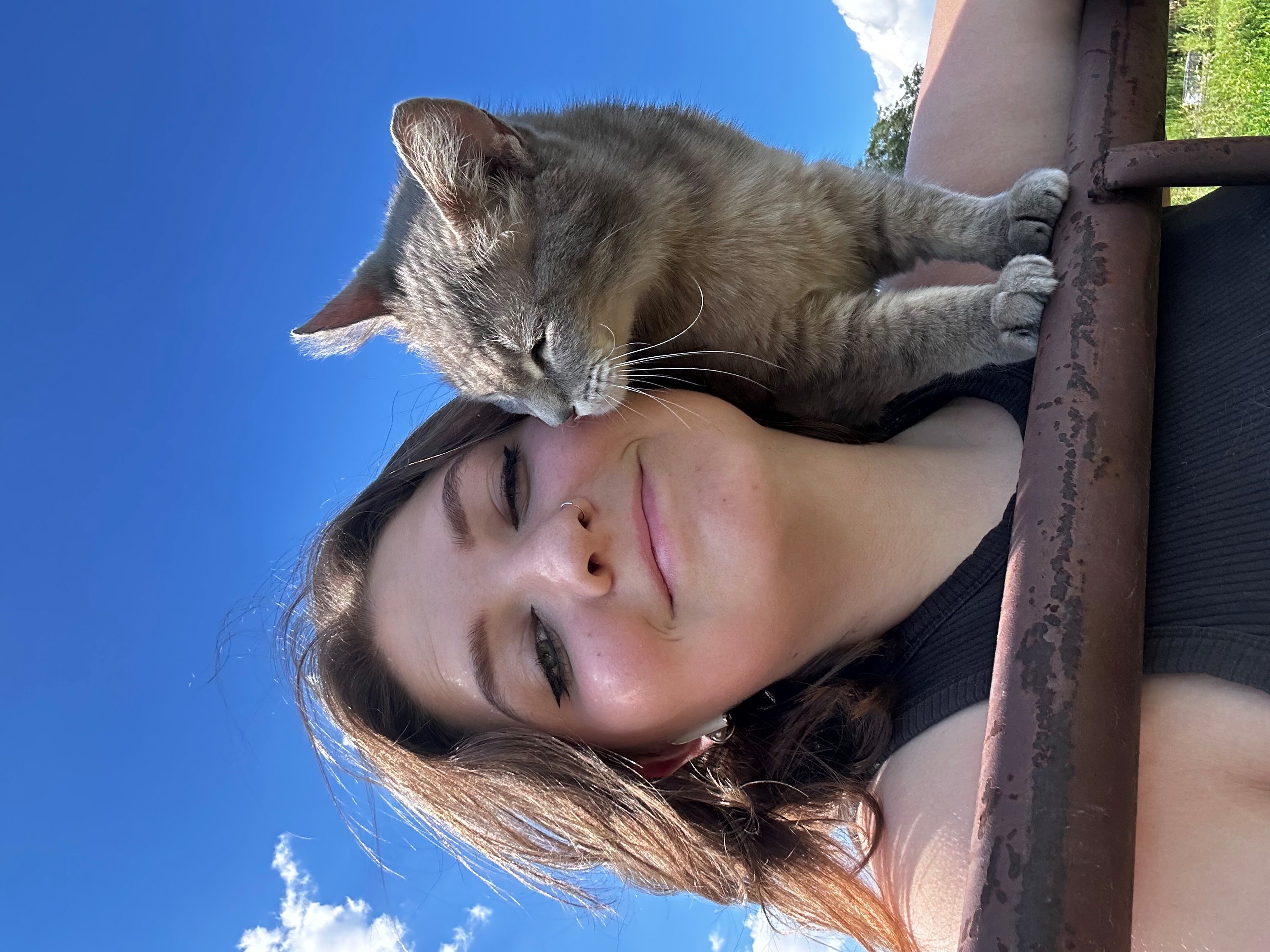 student with cat
