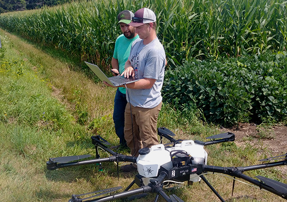 Agricultural Business student Grant Buwalda prepares his drone for surveying