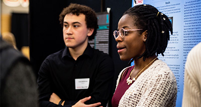 Two Psychology Research students present their research during the URSCA Fall Gala