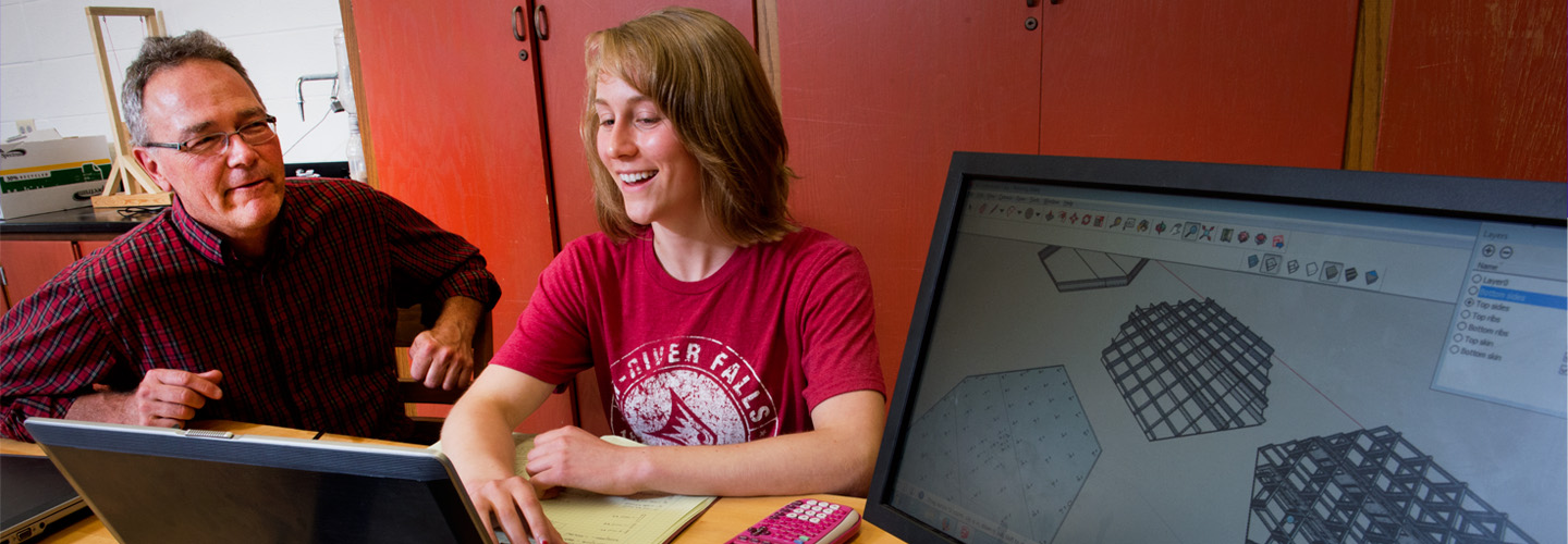 Physics student and professor review data from an experiment