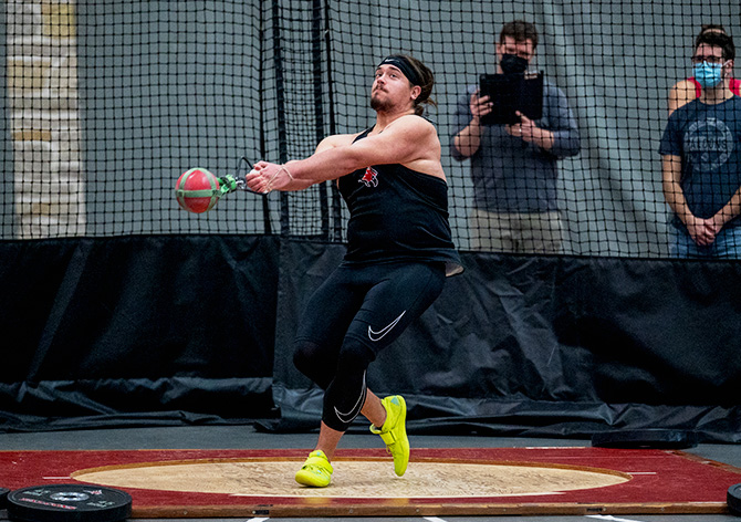 Track and Field athlete participates in the weight throw event