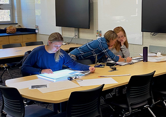 Conservation students work on a project in class