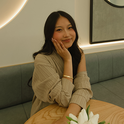 image of Cindy Thao with her right hand on her face