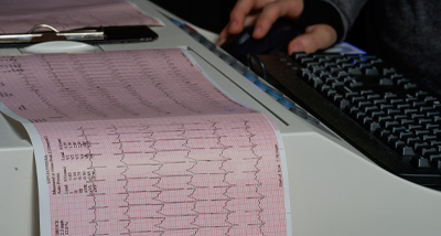 Clinical Physiology graduate students study the readings of a heart rate monitor