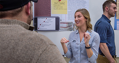 Communication studies student presents their senior capstone project to the public