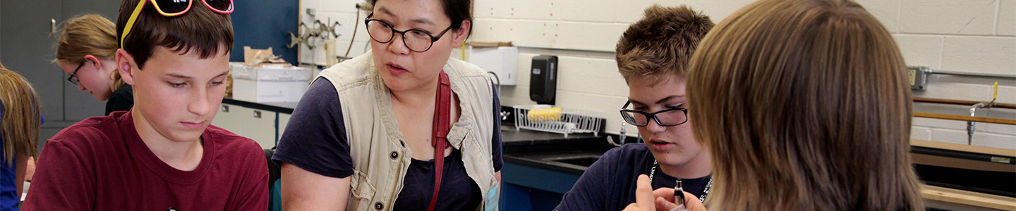 Three high schoolers participate in a science camp