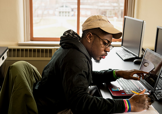 Data Science student takes notes during class