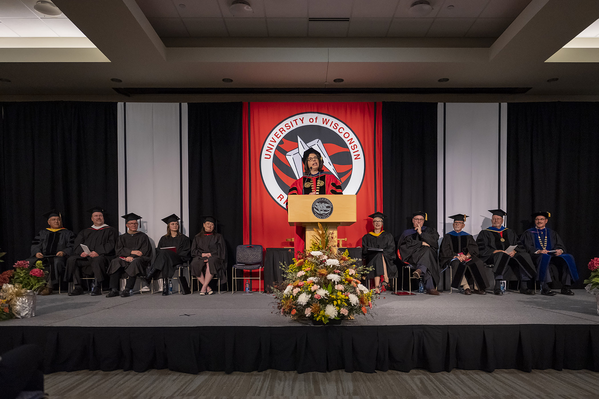 Chancellor Gallo speaks at a podium