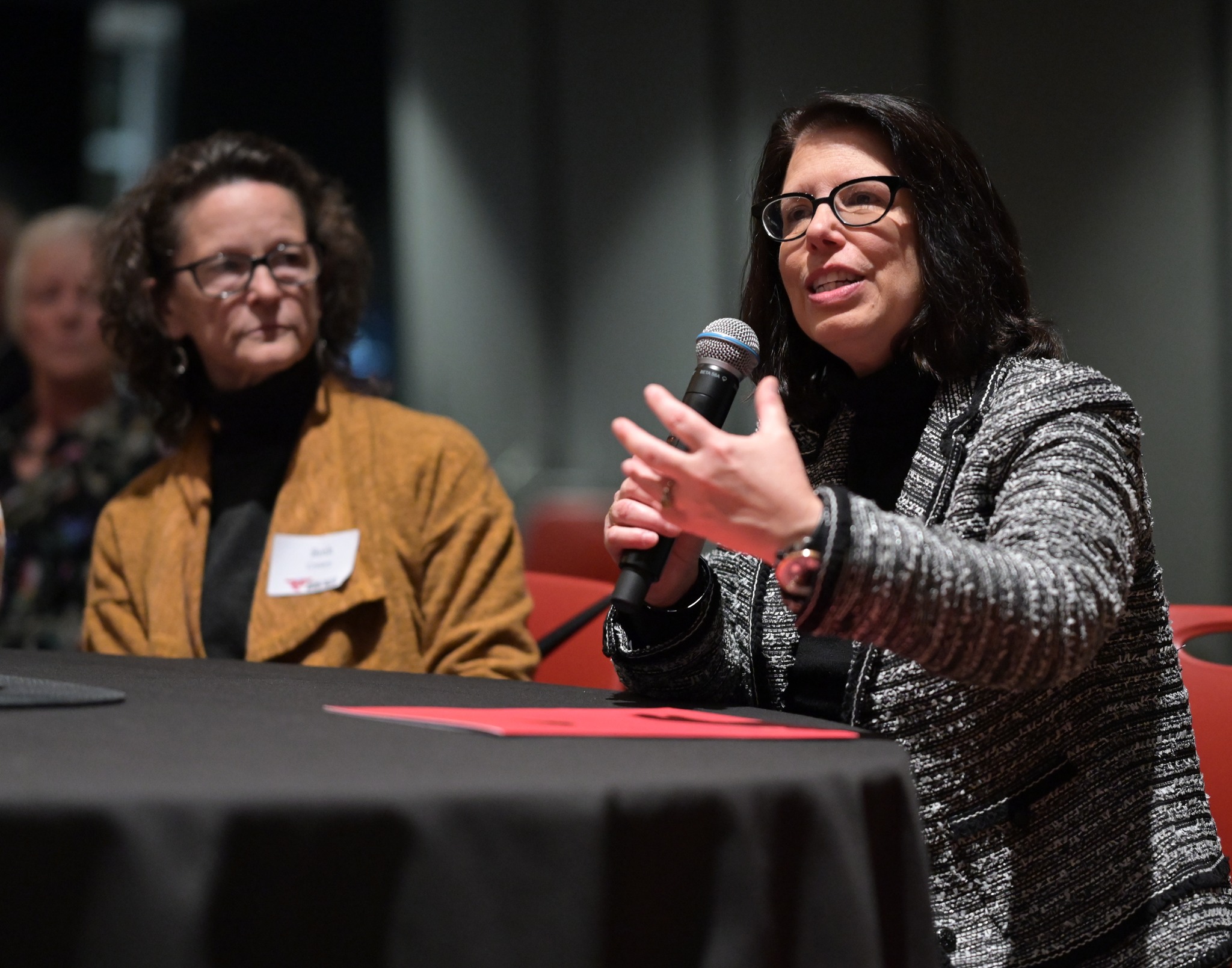 Chancellor Maria Gallo asks a question during the the interview with Annie Murphy Paul