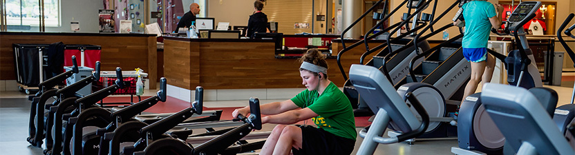 Student using Rowing Machine in the UWRF Fitness center