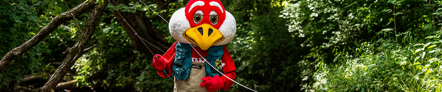 Freddy Falcon fly fishes in the kinnickinnic river