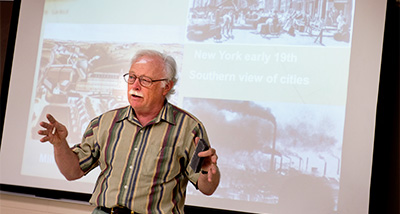 History Professor speaking in front of students