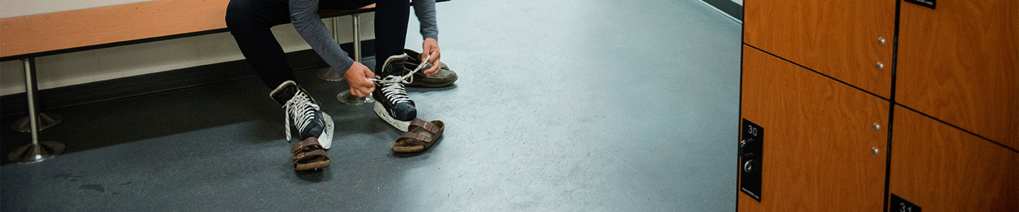 Student laces up their ice skates