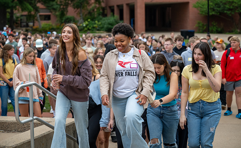Students walk into the UW-River Falls University Center during Orientation in August 2025.