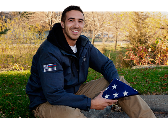 UWRF Veteran holds a folded flag