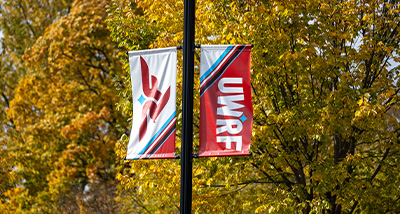 The UWRF lightpost banner in the fall