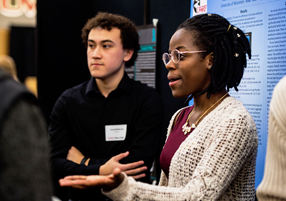 Two Psychology Research students present their research during the URSCA Fall Gala