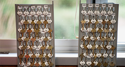 Wall of keys to student dorms on Move-In Day