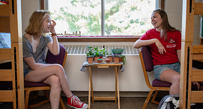 Two students in their dorm room