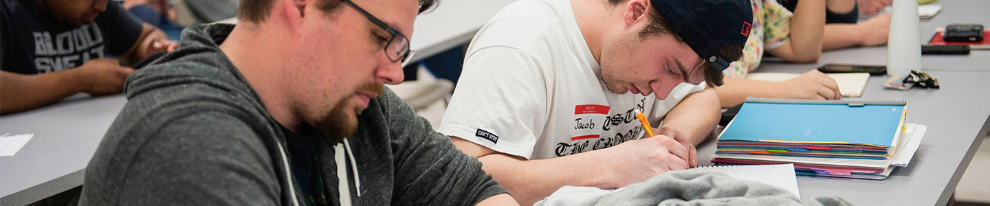 Two students taking a math test