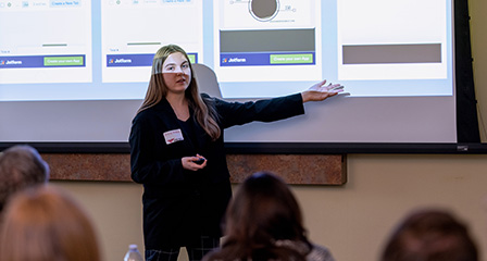 A business student presents their project during the Innovation Challenge