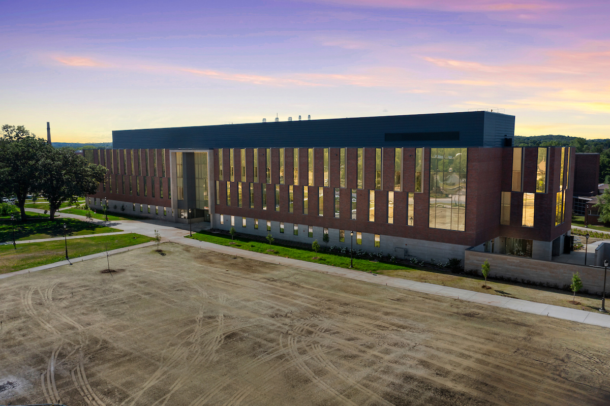 An aerial photo of SciTech at dusk